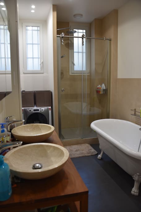Bathroom with shower and bath