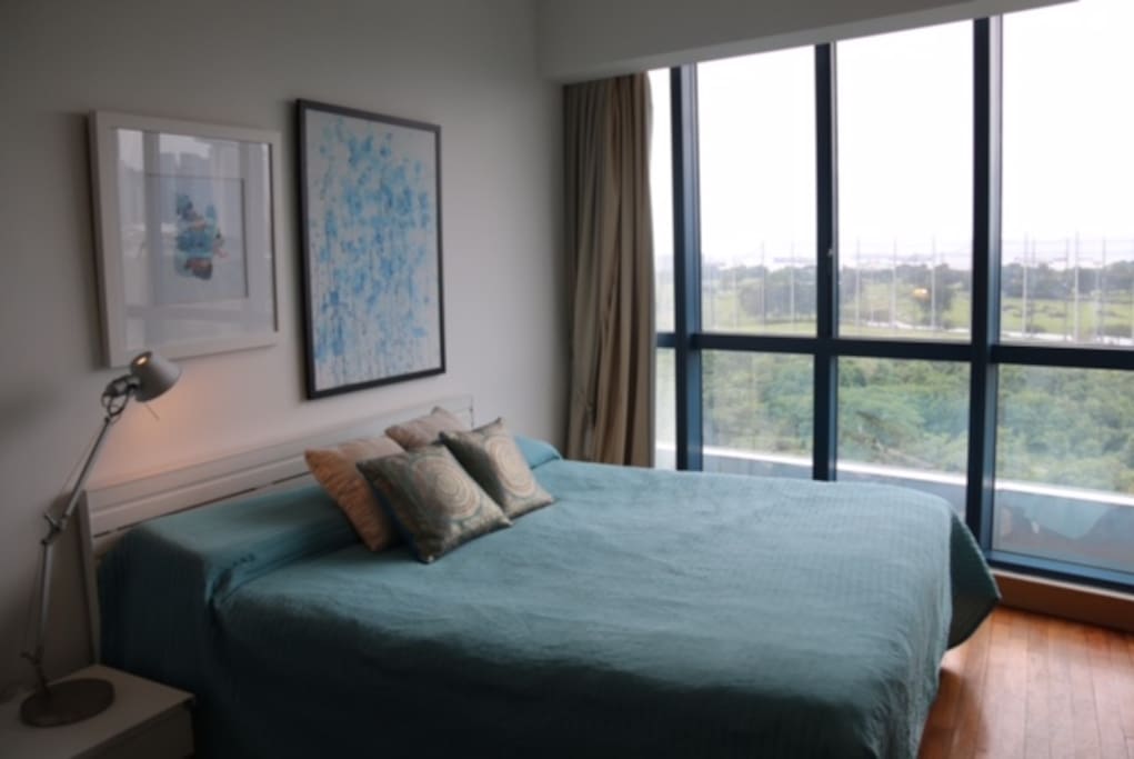 Master bedroom with king size bed and ensuite master bathroom