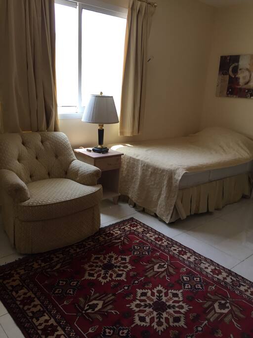 Very comfortable chair for watching TV. A big window that brings lot of day light to the room