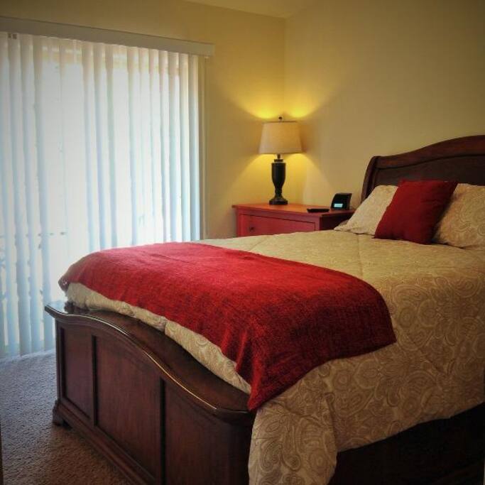 Master Bedroom showing sliding glass doors to private balcony.