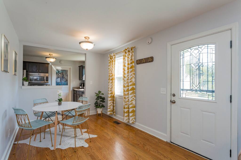 Upon entrance to your right is the dining area and kitchen.