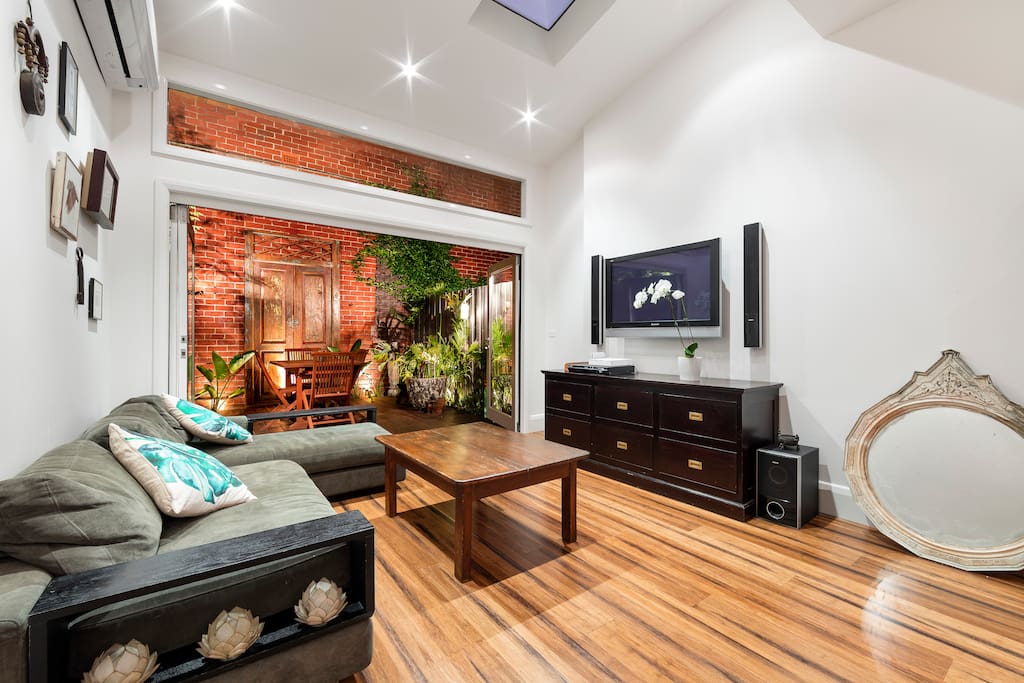Living room area is bathed in natural light during the day thanks to 2 huge skylights. Netflix included.
