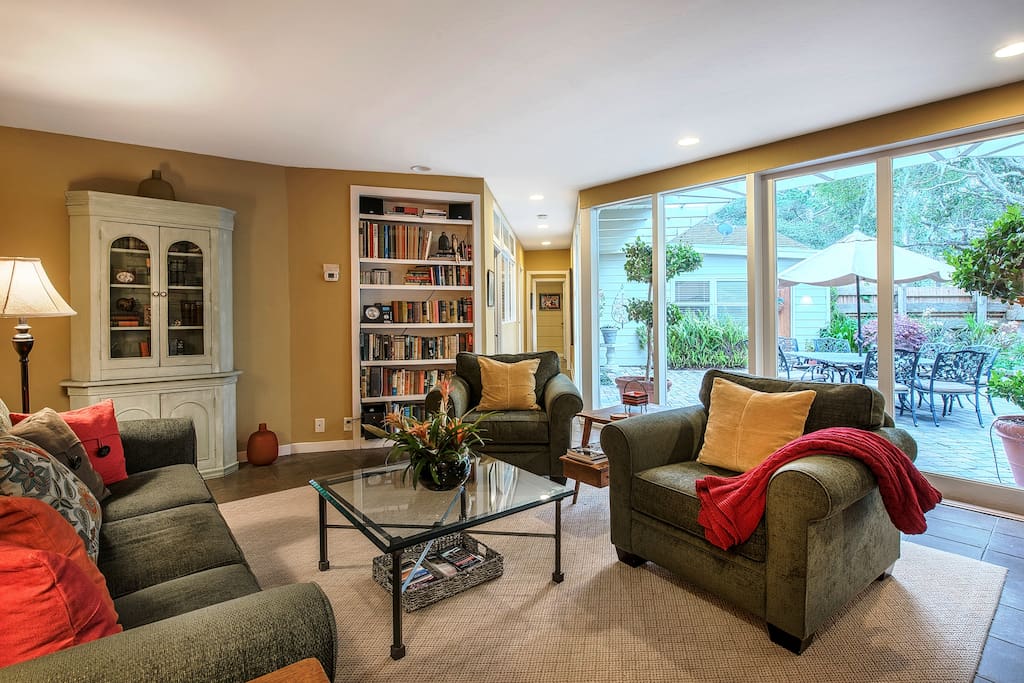 The spacious living room with fireplace is the perfect gathering place.