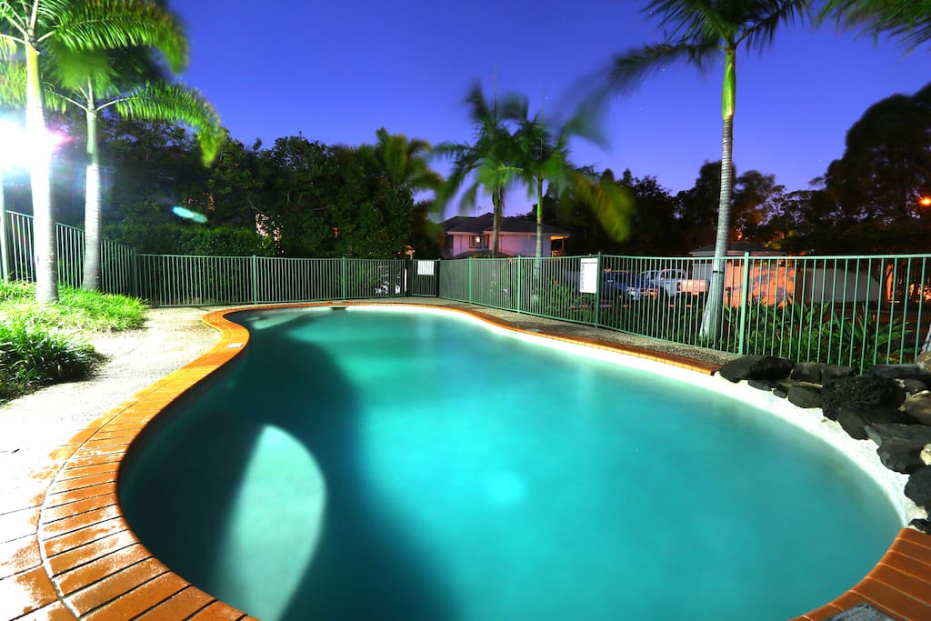 Large complex pool with tropical oasis setting