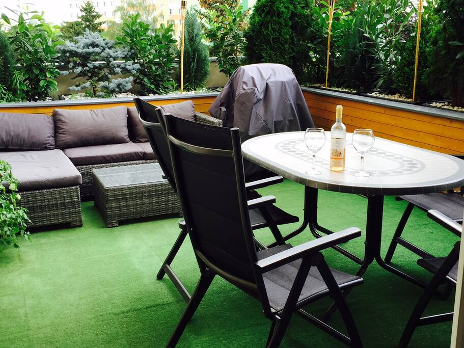 Terrace with greenery and grill