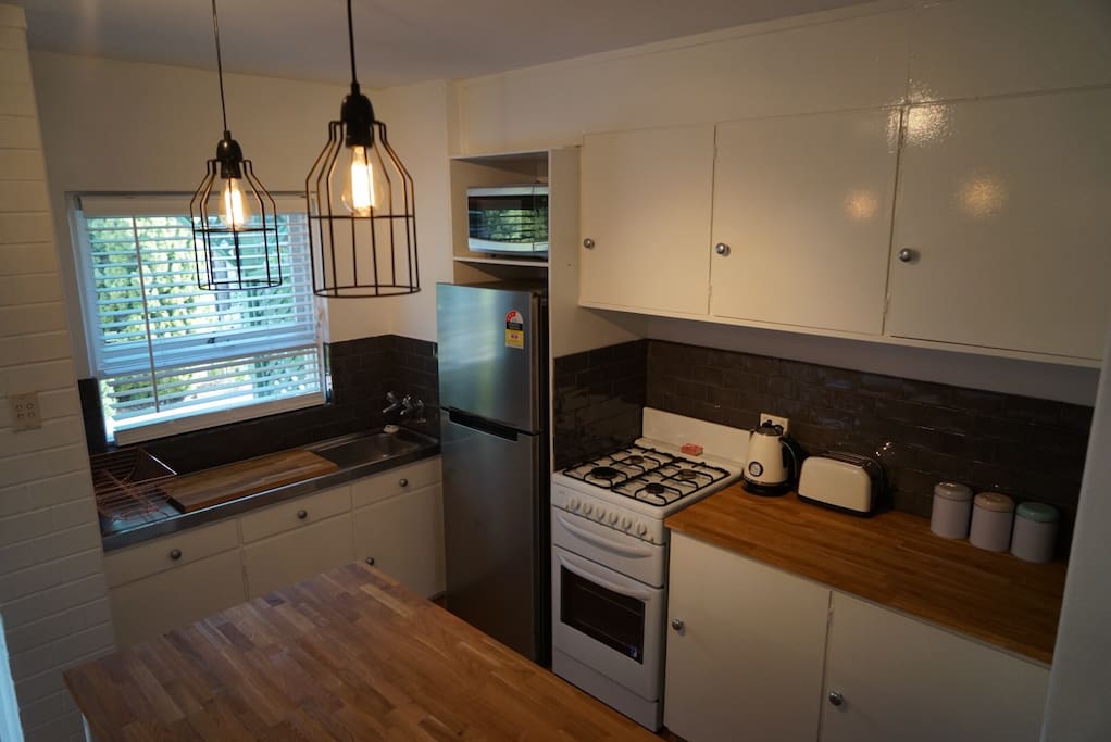 Fully equipped kitchen with all appliances as well as basics such as coffee and tea