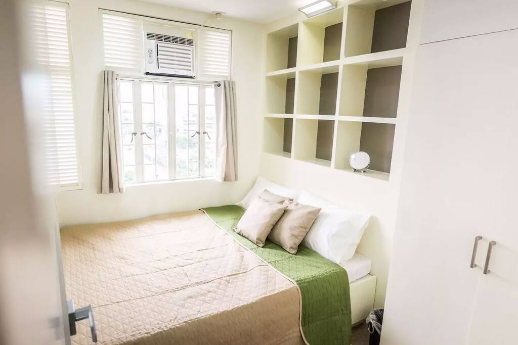 The 10Charm Master Bedroom, where you'll be getting a good night's sleep on the queen-size bed after your tiring day of travelling. You'll have a fully functioning air conditioner and wardrobe at your disposal. Sheets are washed the day after every check-out, so the bed is fresh and clean upon your check-in. Sweet dreams!