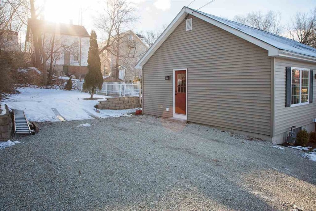 Driveway, left of the house