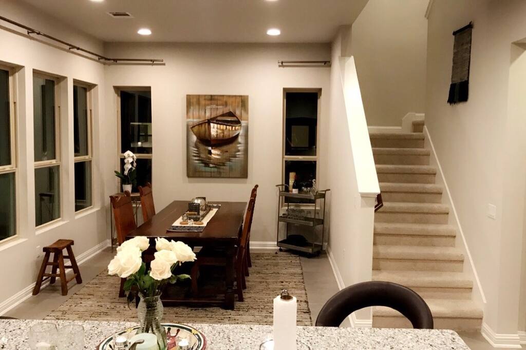 Stairs to master suite and washer and dryer room.