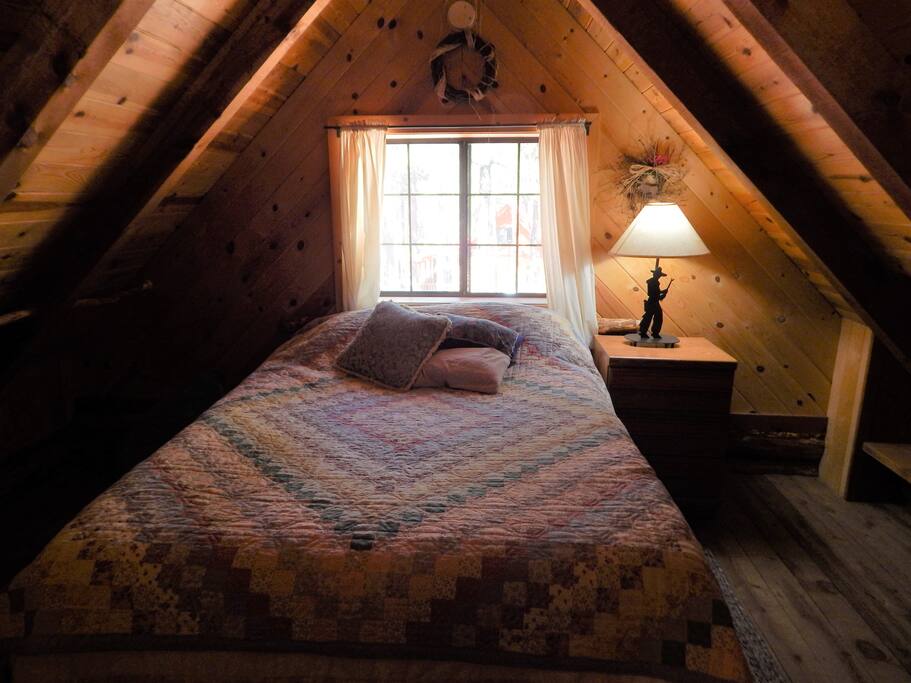 Upstairs sleeping loft queen bed