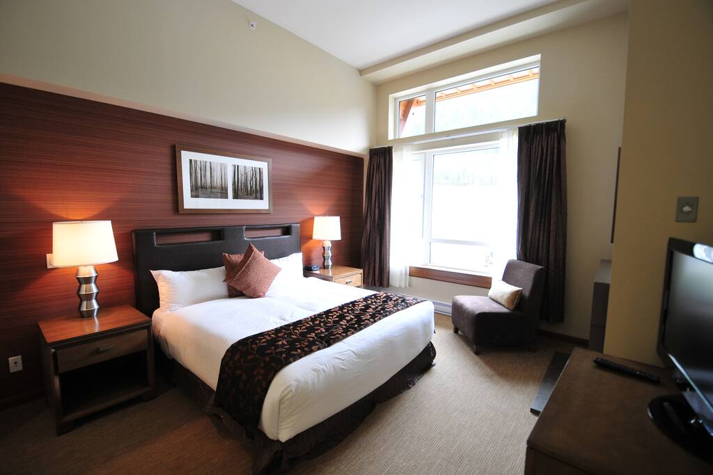 One of the three bedrooms all with own bathroom.