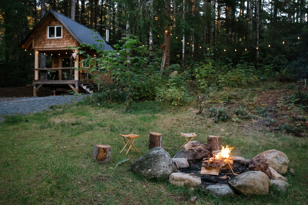 Outdoor fire pit & cabin.
