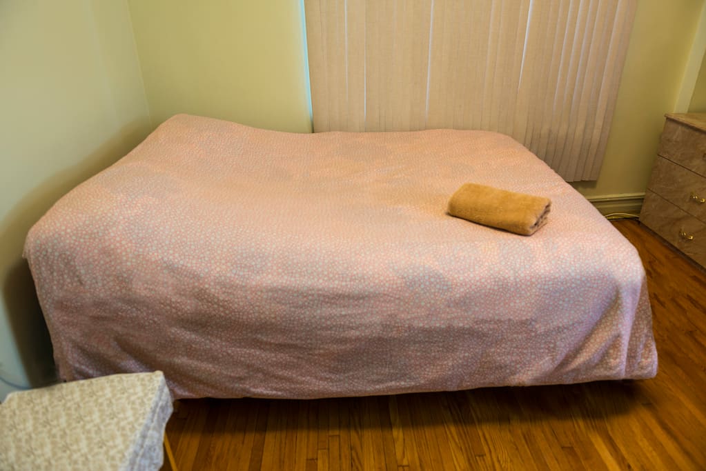 Queen size bed, sleeps two adults comfortably.