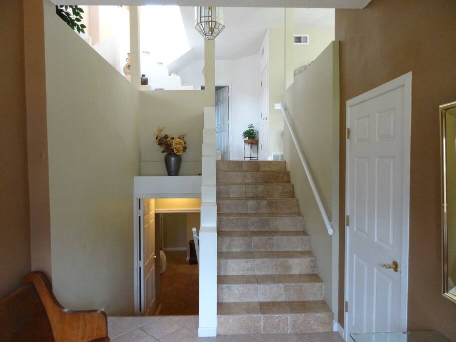 As you enter the house you can see two different levels of the house and if you look close enough you will see stairs to the third level. This picture try's to capture a view of all three levels of the house.