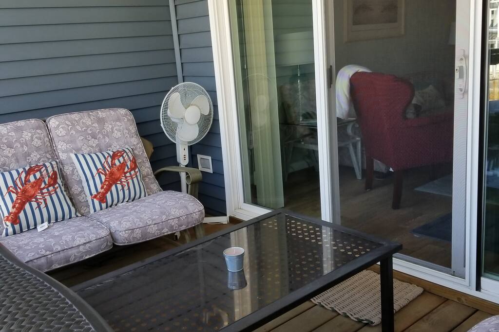 Balcony with 2, two-person, gliders