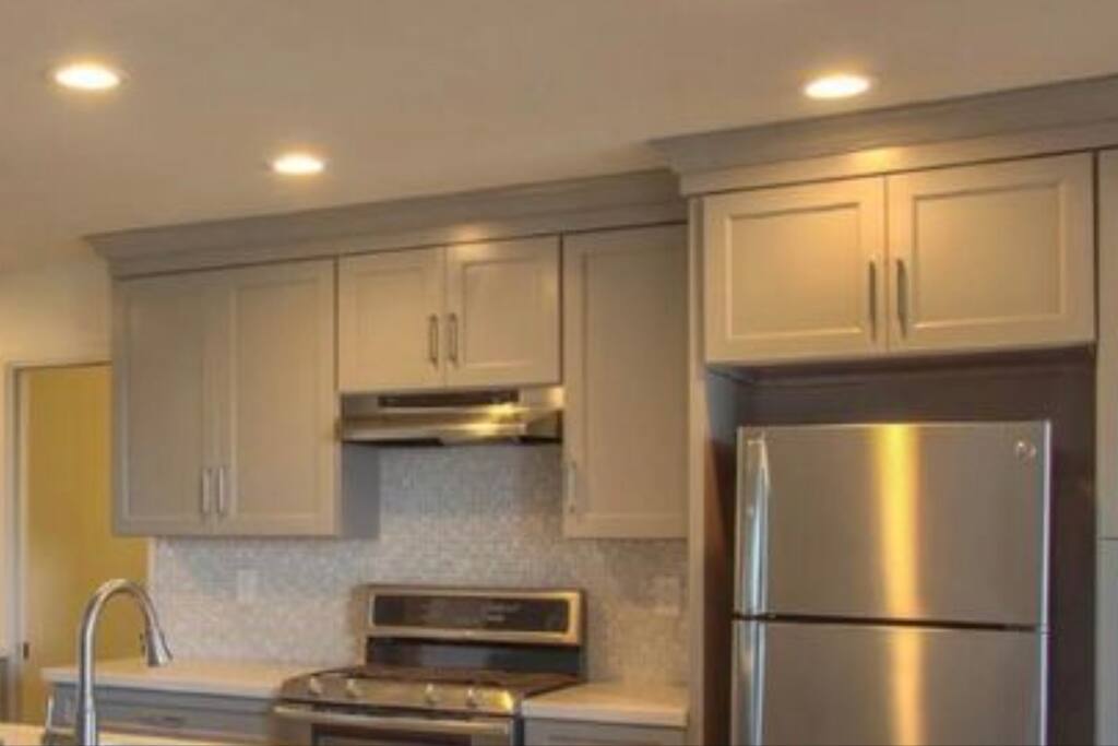 The main house kitchen ..furnished with al the cooking tools .