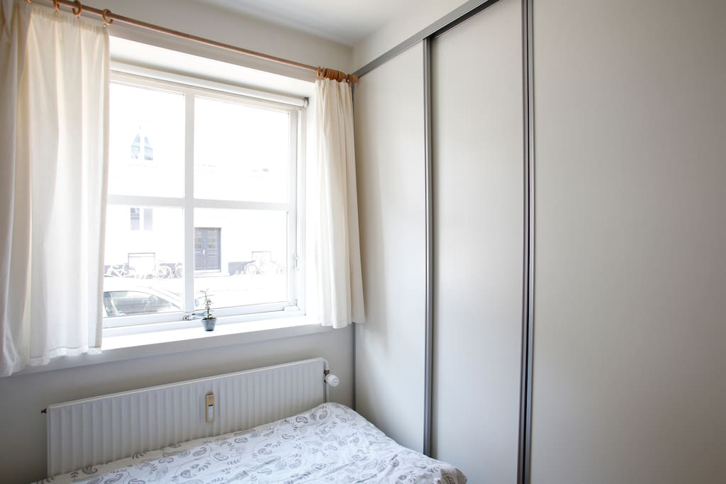 'Your' room with desk and lots of storage.