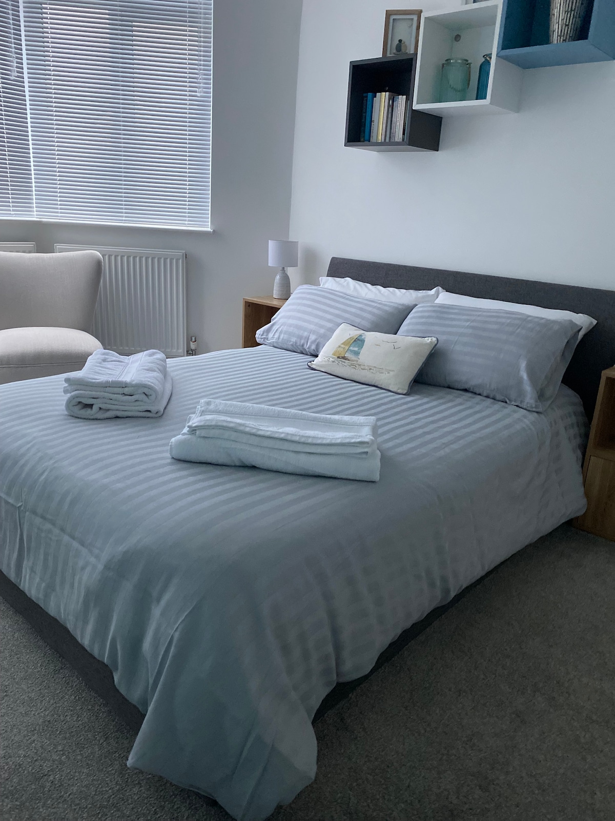 Spacious relaxing main bedroom with two wardrobes