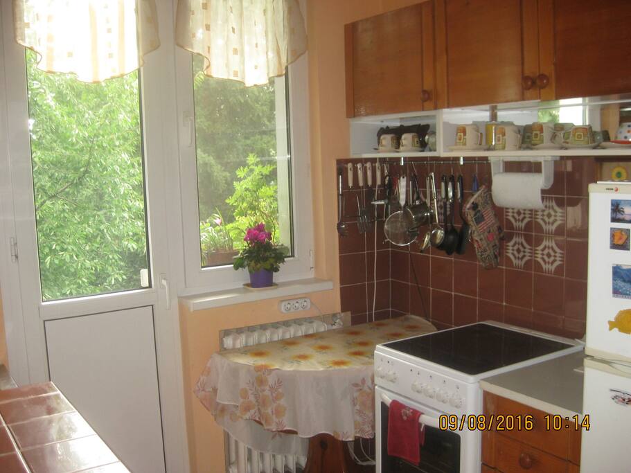 You are welcome to use the fully-equipped kitchen to cook. The kitchen is right across from your bedroom.