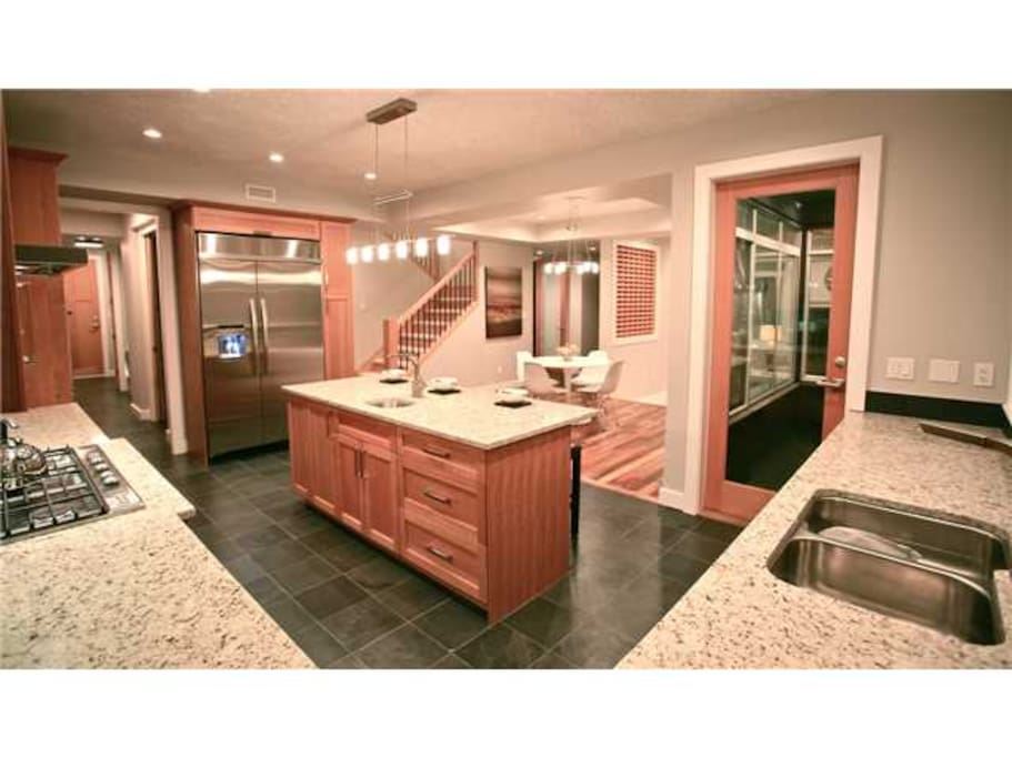 Spacious Modern Kitchen with Great Island for Entertaining and access to large flat backyard