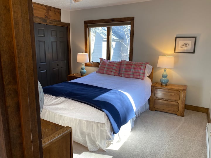 Main floor room has a queen bed 