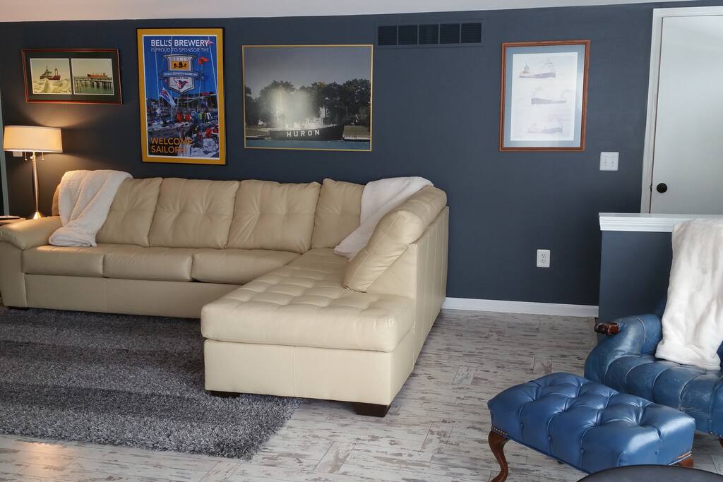 Sleeper sofa. Reading chair w/view of Lake Huron