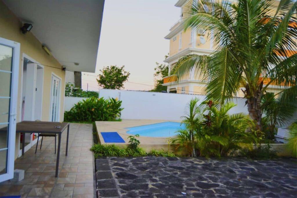 Terrace and outdoor common swimming pool.