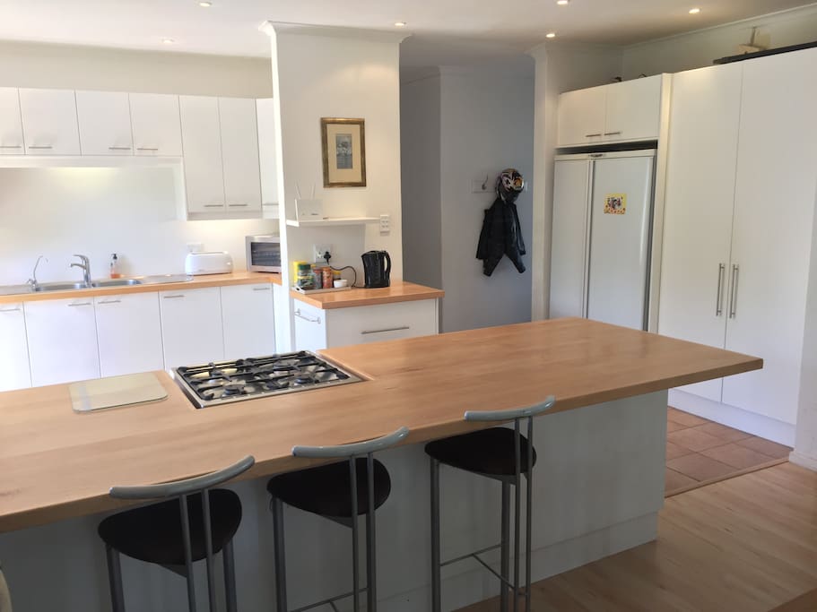 Open plan kitchen leading to passage & rooms