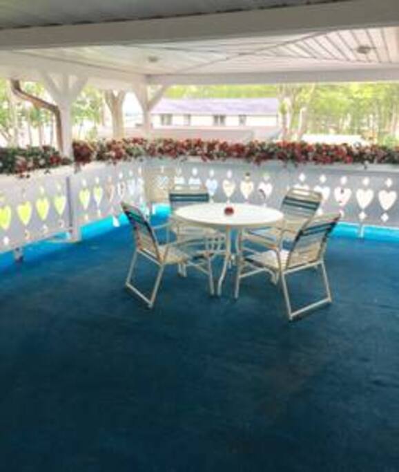 Your balcony, table and chairs for sitting outside.