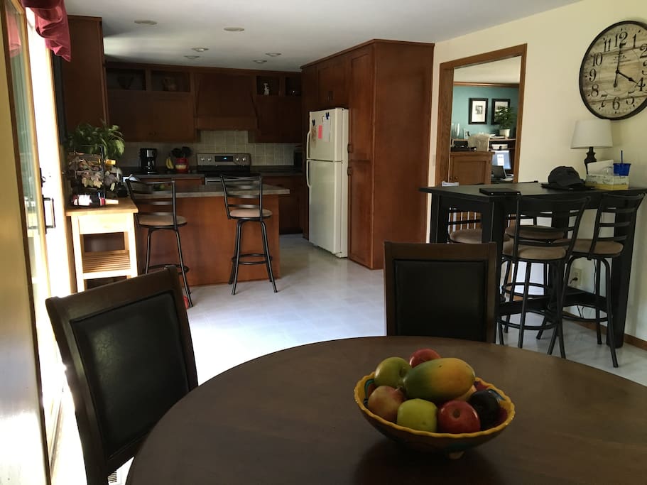 Spacious open concept kitchen, dining, and living area