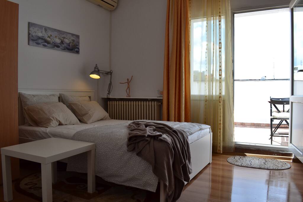 Bedroom with private terrace.