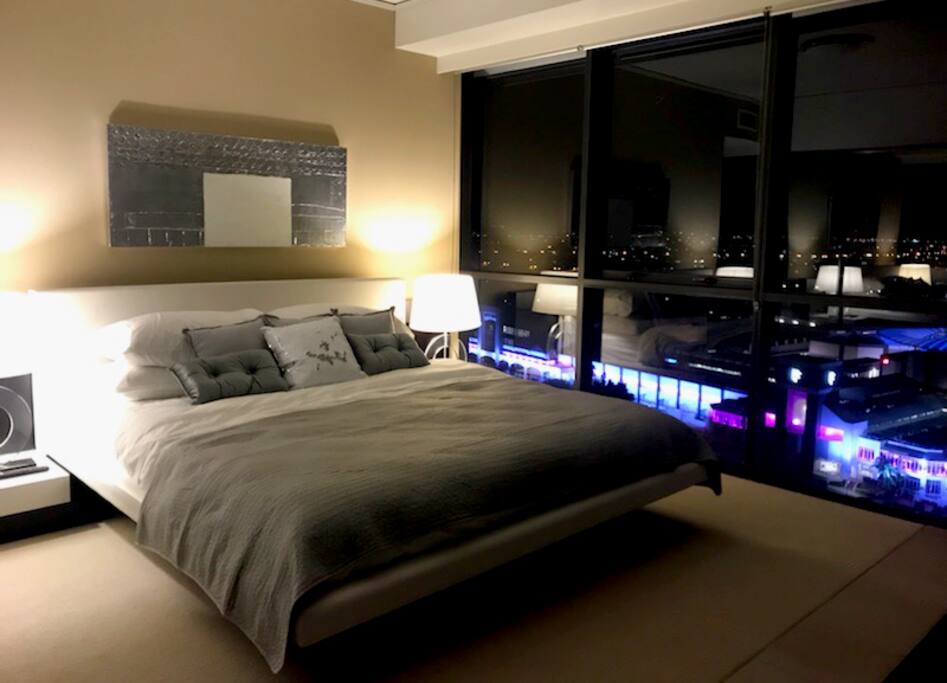 Master bedroom with stunning night views.