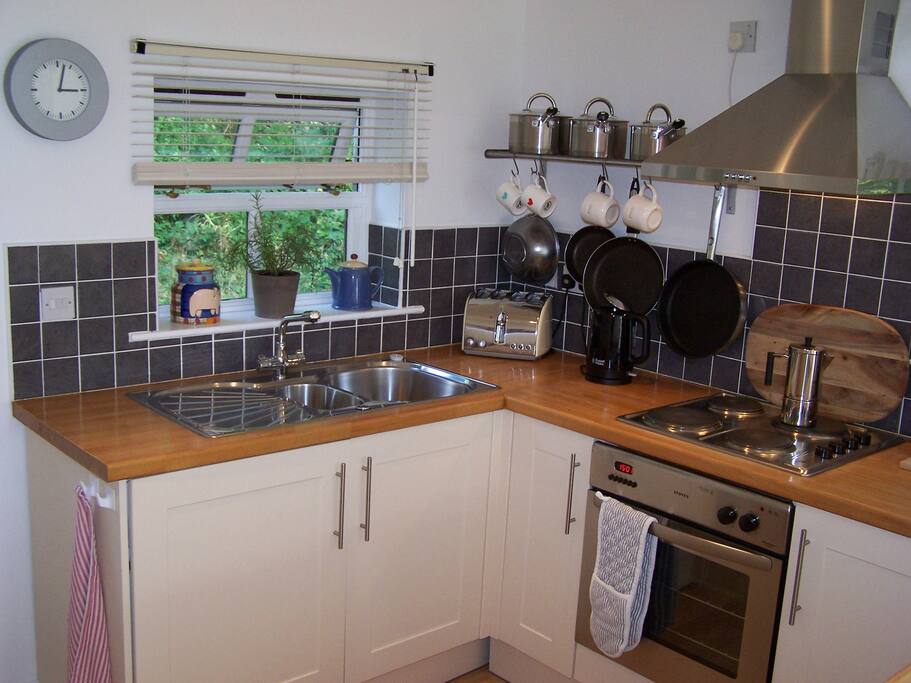 The kitchen area compact but well equipped