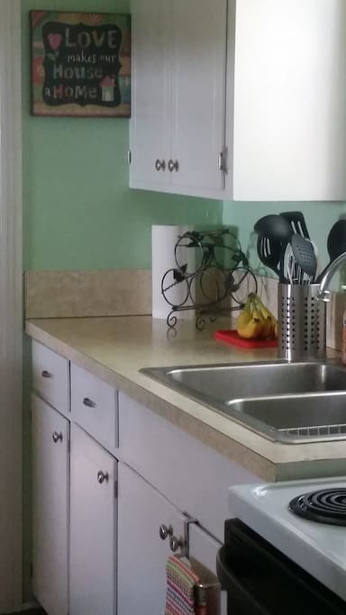 Kitchen with coffee, tea, sugar & cream