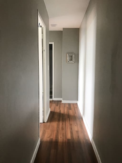 Hallway to room and bathroom