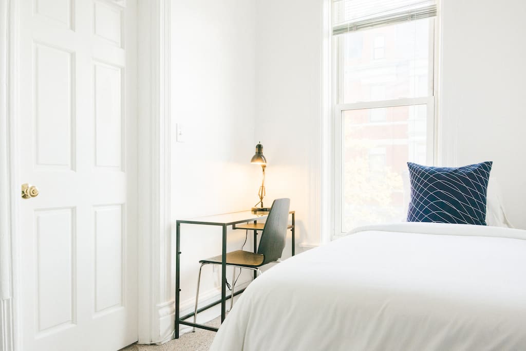 The bedroom has the best views of Lincoln Park.