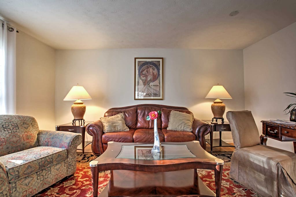 Gather together and enjoy each others company in the living room with homey decor.