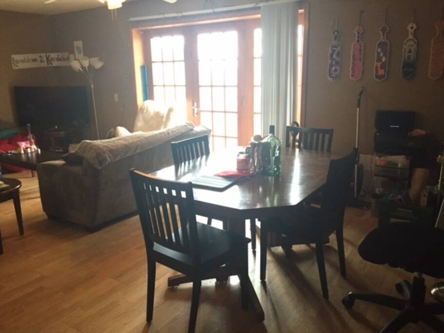 Dining room with table and four chairs.