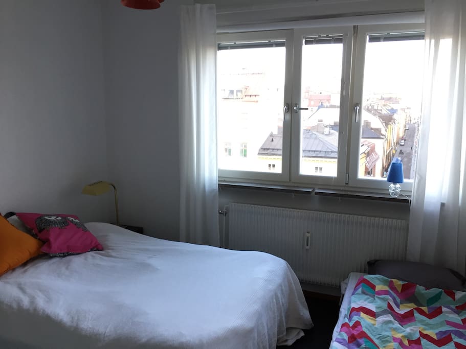 Bedroom with double bed 140 cm and one extra bed 75cm.
