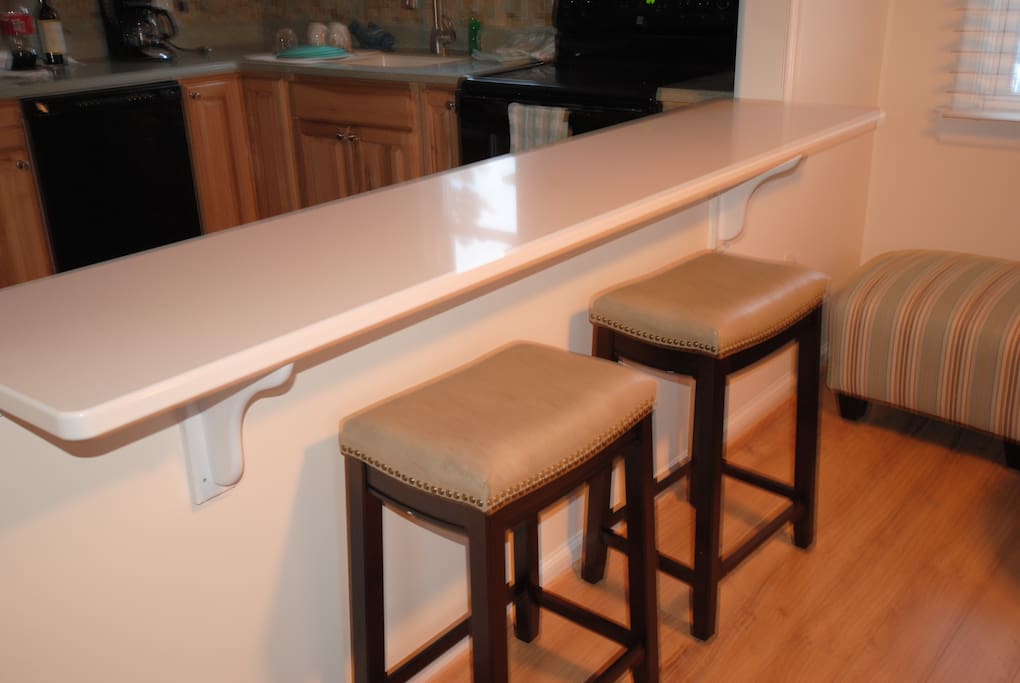 Counter seating faces the kitchen so you can keep an eye on the cook ;)