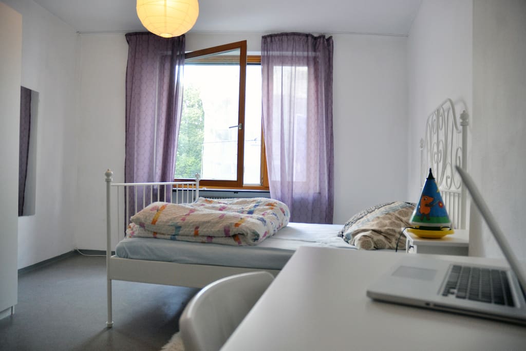 Bedroom with double bed, blanket, pillows provided. Big Mirror and Window. Table and chair to use for working etc.