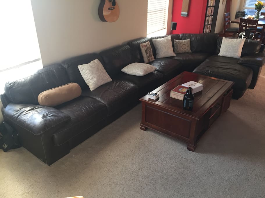 Lounge area equipped with TV, game consoles & surround sound.