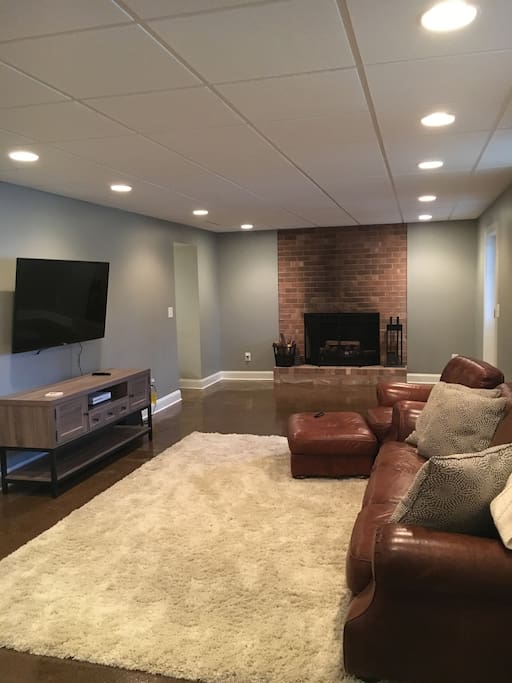 Relax in front of the fireplace on our leather couch!
