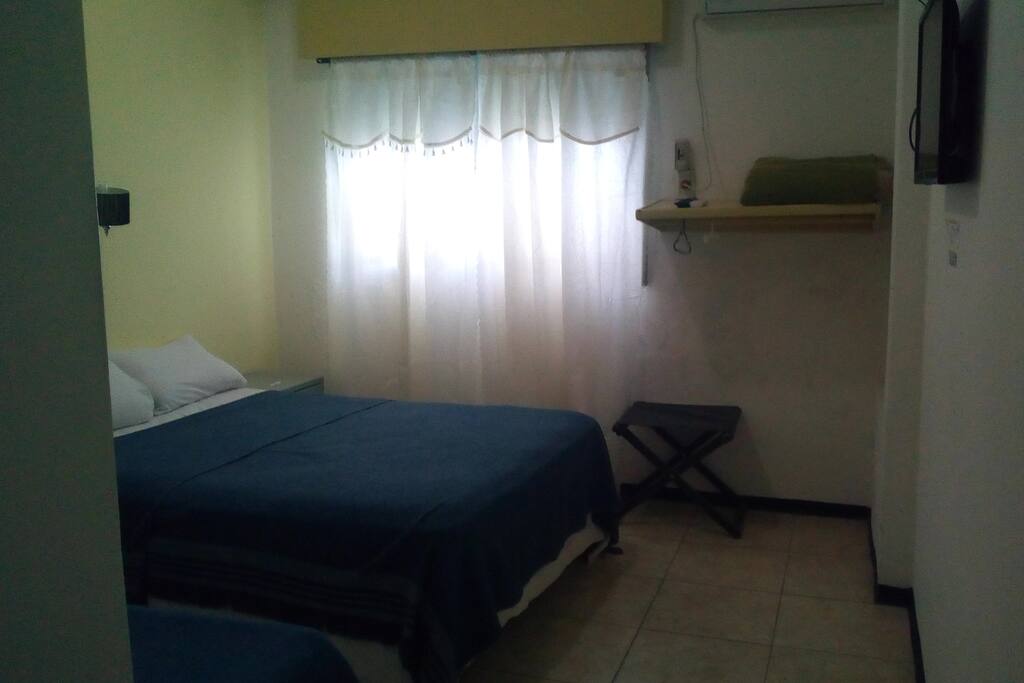HABITACION TRIPLE MATRIMONIAL MAS CAMA INDIVIDUAL
