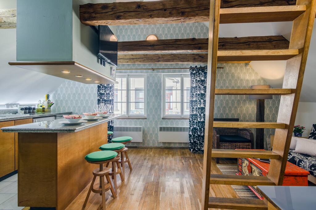 Our kitchen has everything you need, it very well equipped. So let´s just sit on these lovely cosy chairs and enjoy our tasty meal.