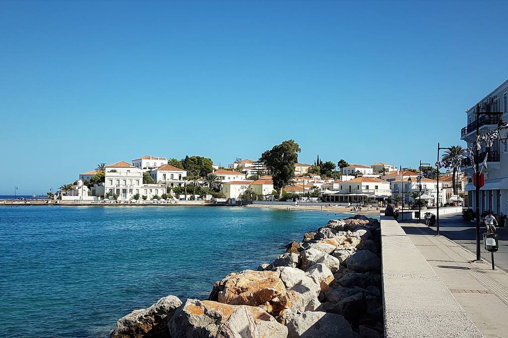 View of Agios Mamas chapel, the main beach of the town, the house is at 70 meters behind the big eucalyptus tree
