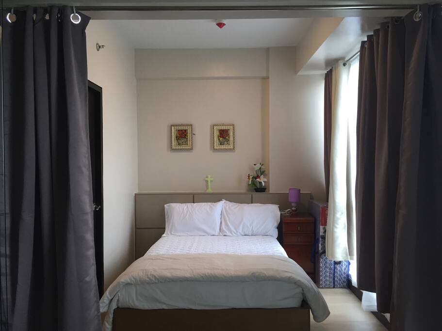 This bedroom has a glass sliding door to provide you with some extra privacy.