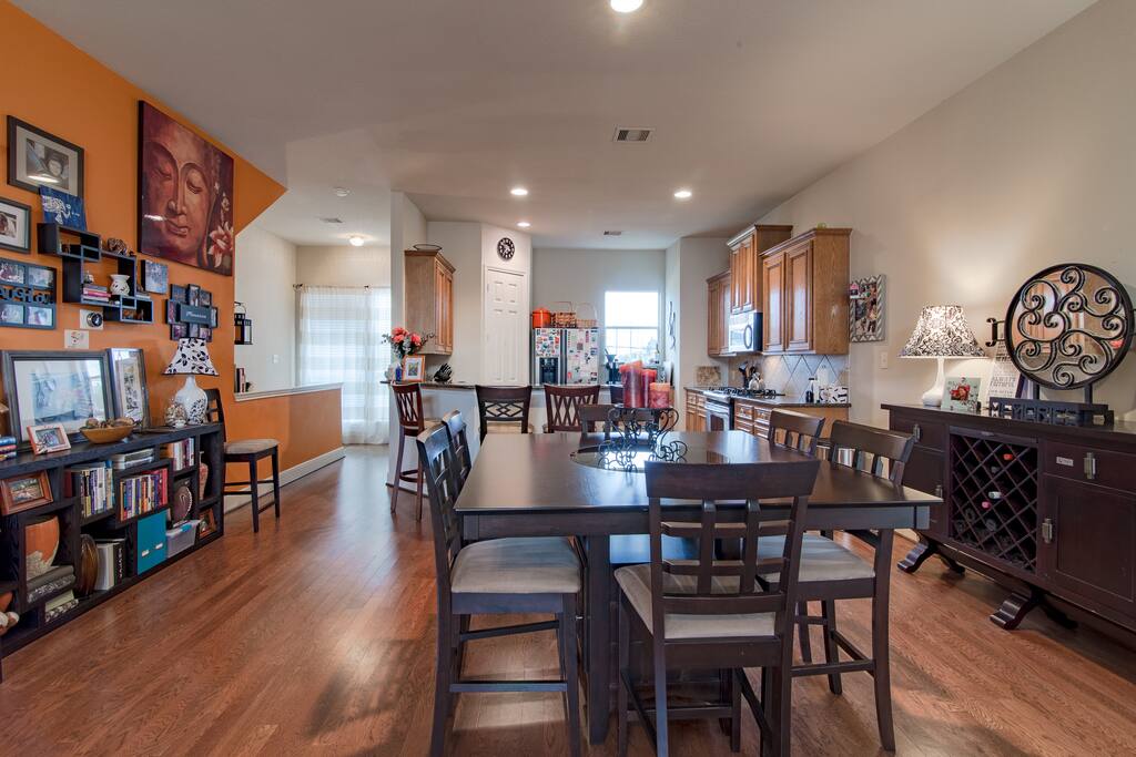 2nd Floor | The orange "Zen Wall" adds a pop of color and culture to the open floor plan.