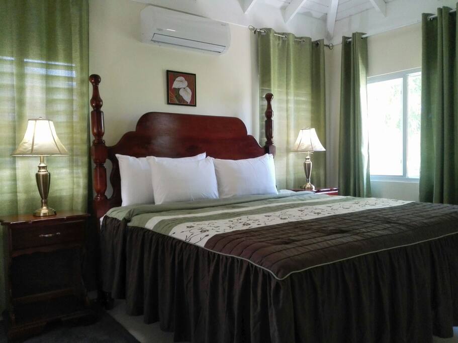 Master bedroom with king sized bed. AC throughout villa.