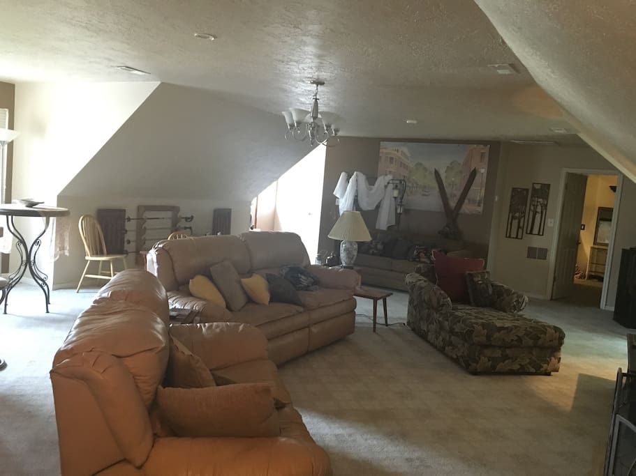 Spacious Living Area with Recliner Couch & Loveseat, Chaise Lounge & Sofa Bed.